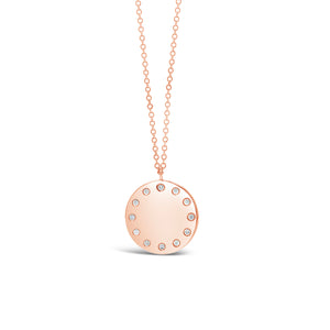 Diamond Dotted Disc Pendant Necklace  -14K gold weighing 3.60 grams  -12 round diamonds weighing .09 carats