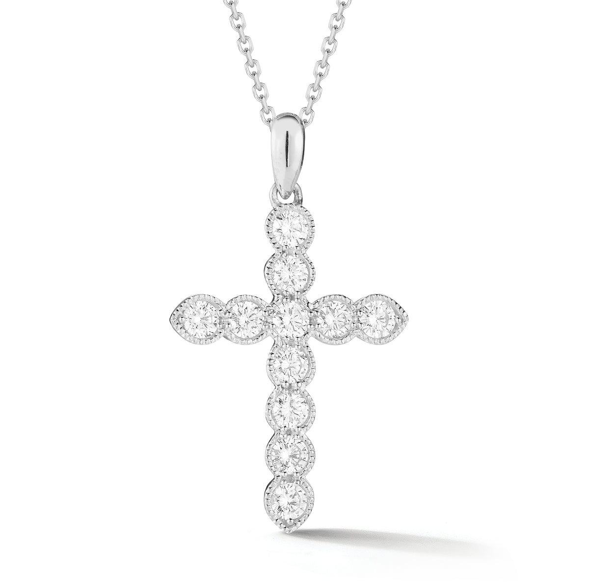 Bezel-Set Diamond Cross Pendant with Antique Milgrain  The perfect gift for a christening, communion, confirmation, birthday, or holiday.  -14K gold weighing 3.80 grams  -11 round bezel-set brilliant diamonds k 0.62 carats