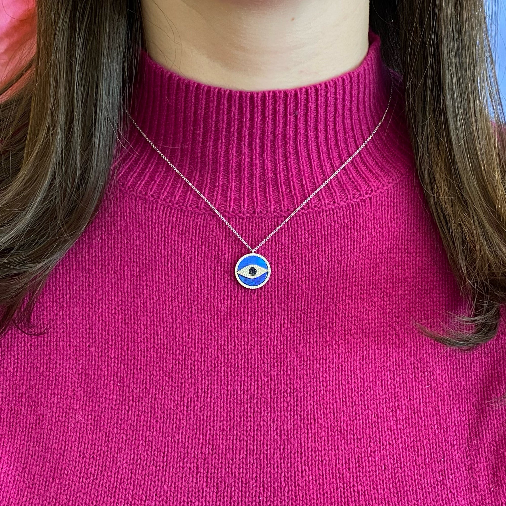 Opal & Diamond Evil Eye Pendant Necklace  -14K gold weighing 3.26 grams  -100 round diamonds totaling 0.23 carats  -7 sapphires weighing .07 carats  -1 opal weighing 3.21 grams