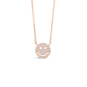 Solid 14k rose gold weighing 1.87 grams with 63 round diamonds weighing .14 carats Small Smiley Face Pendant Necklace | Nuha Jewelers