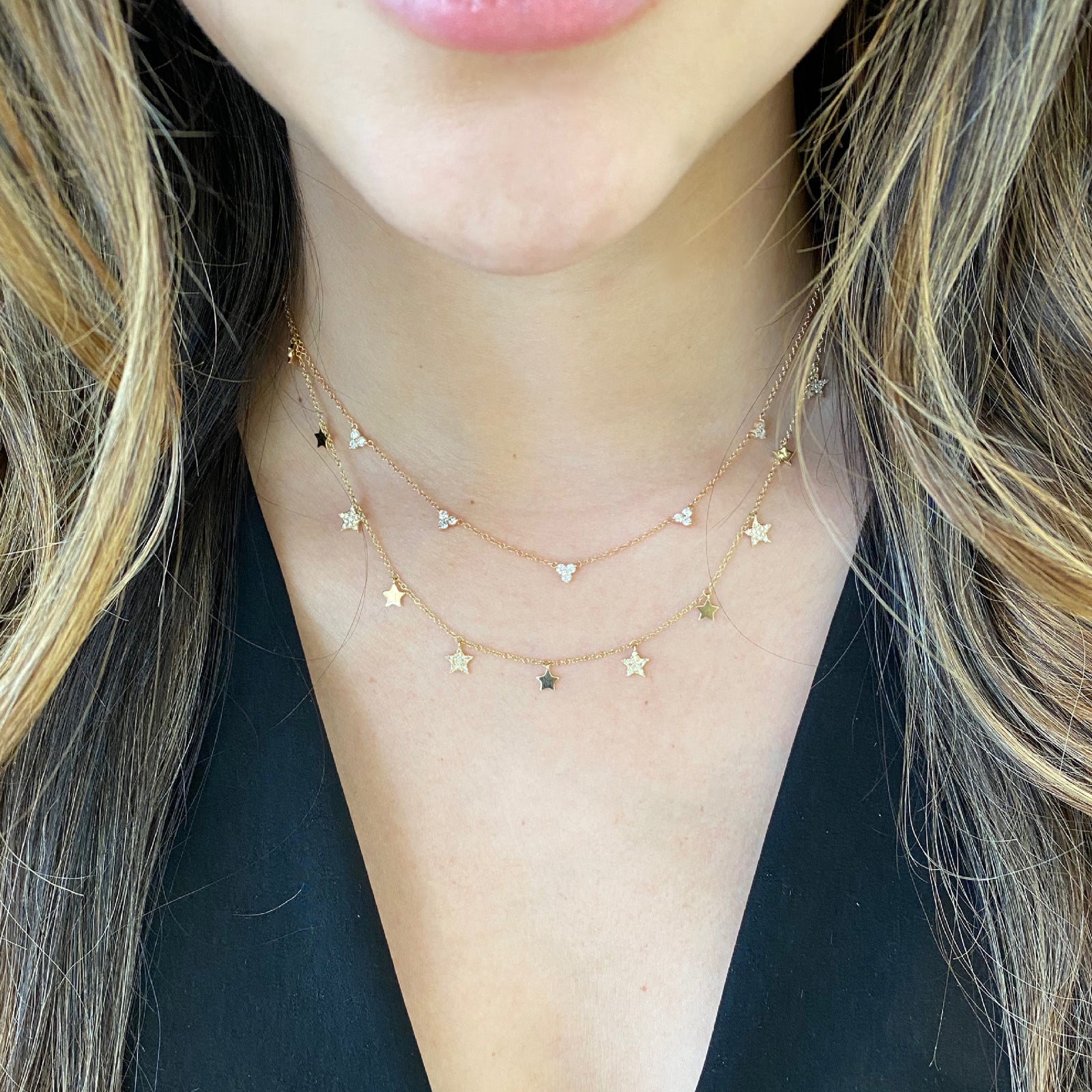 Diamond Twinkle Star Necklace  -14k gold weighing 3.35 grams  -60 round pave set diamonds weighing .19 carats