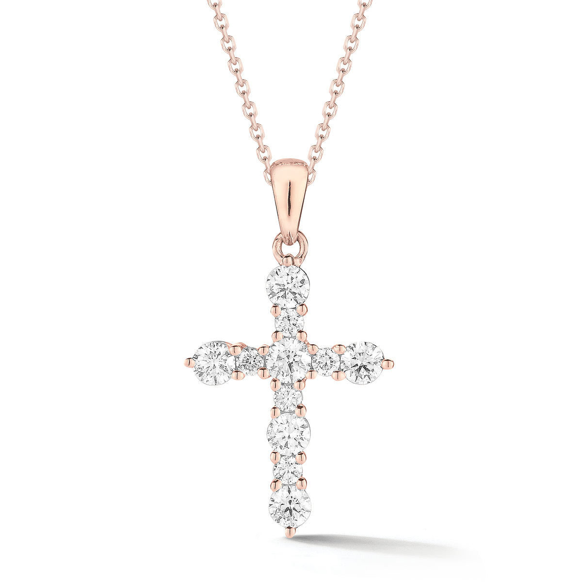 Diamond Cross Pendant Necklace  An ideal christening, communion, confirmation, birthday, or holiday gift!  -14K gold weighing 2.25 grams  -11 round shared prong-set brilliant-cut diamonds totaling 0.49 carats