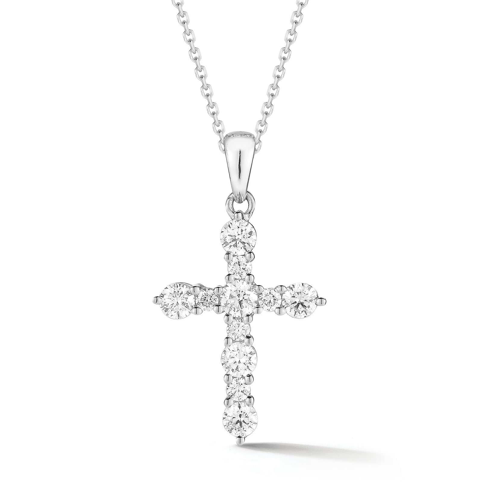 Diamond Cross Pendant Necklace  An ideal christening, communion, confirmation, birthday, or holiday gift!  -14K gold weighing 2.25 grams  -11 round shared prong-set brilliant-cut diamonds totaling 0.49 carats