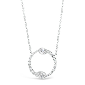 Round & Pear-Shaped Diamond Circle Pendant Necklace  -14K gold weighing 3.7 grams  -22 round diamonds totaling 0.43 carats  -2 pear-shaped diamonds totaling 0.58 carats