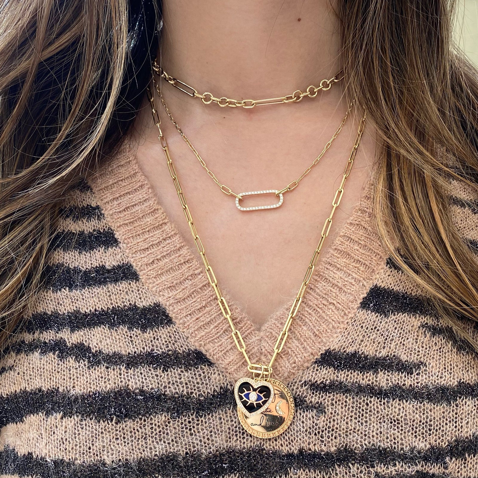 Diamond & Enamel Evil Eye Heart Pendant - 14K yellow gold weighing 2.59 grams - 51 round diamonds totaling 0.22 carats