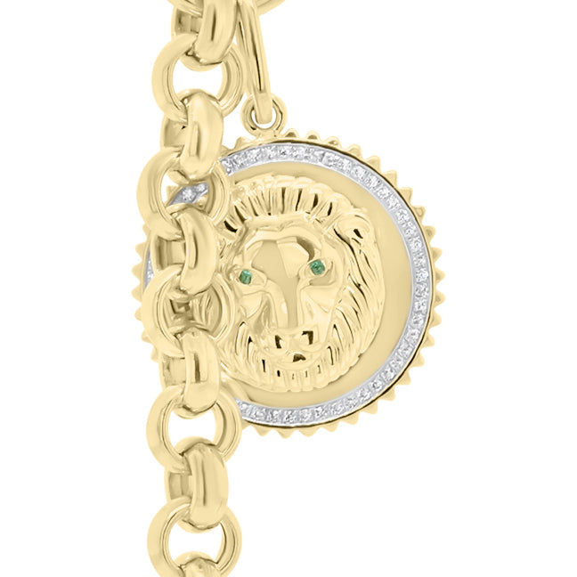 Diamond & Emerald Lion Pendant - 14K yellow gold weighing 4.95 grams  - 54 round diamonds totaling 0.15 carats  - 2 emeralds totaling 0.01 carats
