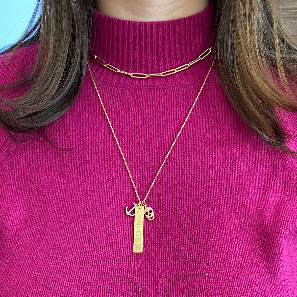 Female Model Wearing Diamond Initials Bar Pendant  - 14K gold weighing 7.3 grams  - 74 round diamonds totaling 0.15 carats