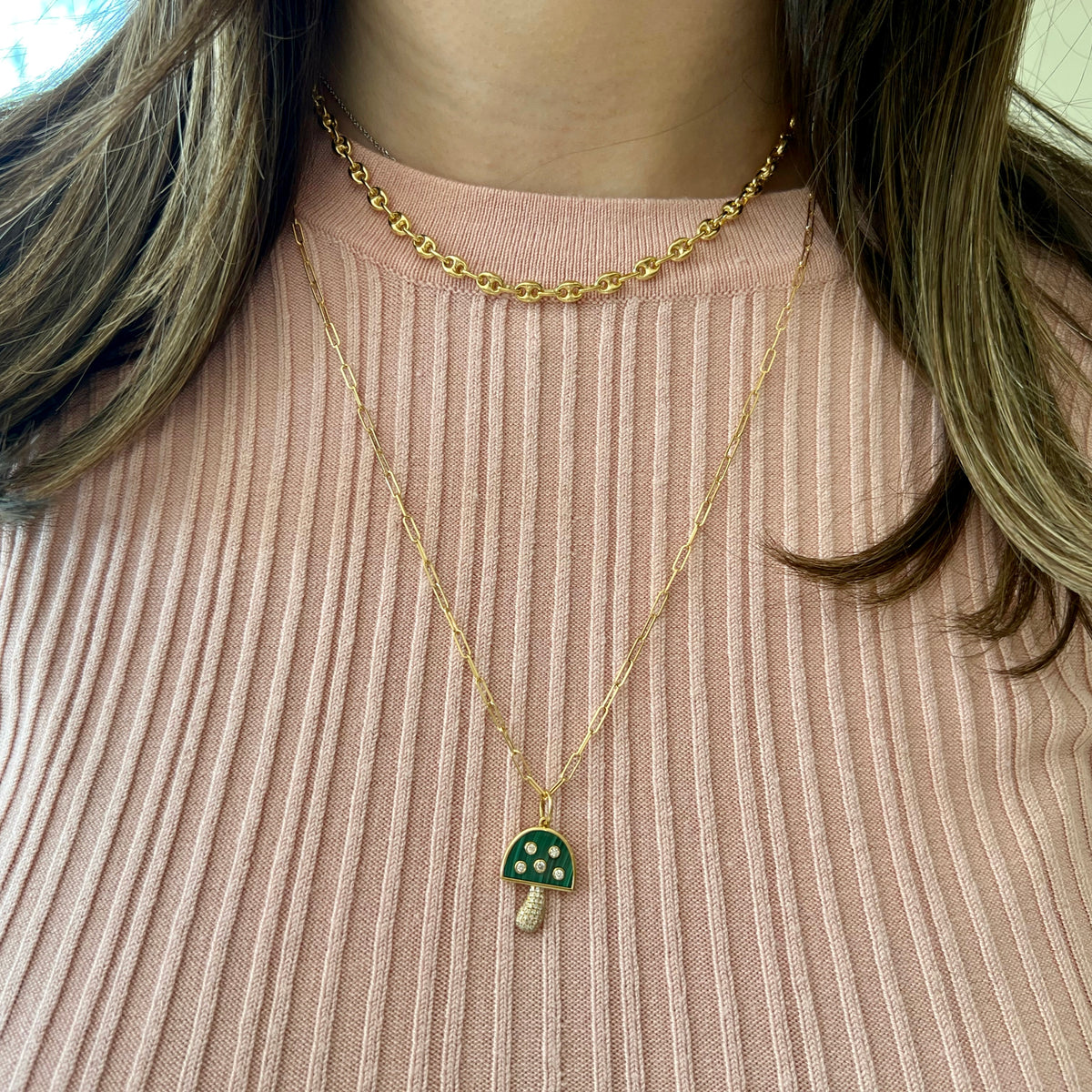 Female Model Wearing Diamond and Malachite Mushroom Pendant - 14K gold weighing 2.11 grams - 62 round diamonds weighing 0.28 carats | Nuha Jewelers