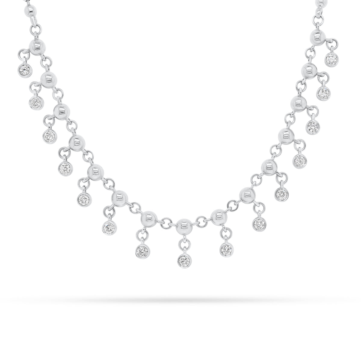 Diamond Bezels Drip Necklace  - 14K gold weighing 17.90 grams  - 15 round diamonds totaling 0.86 carats