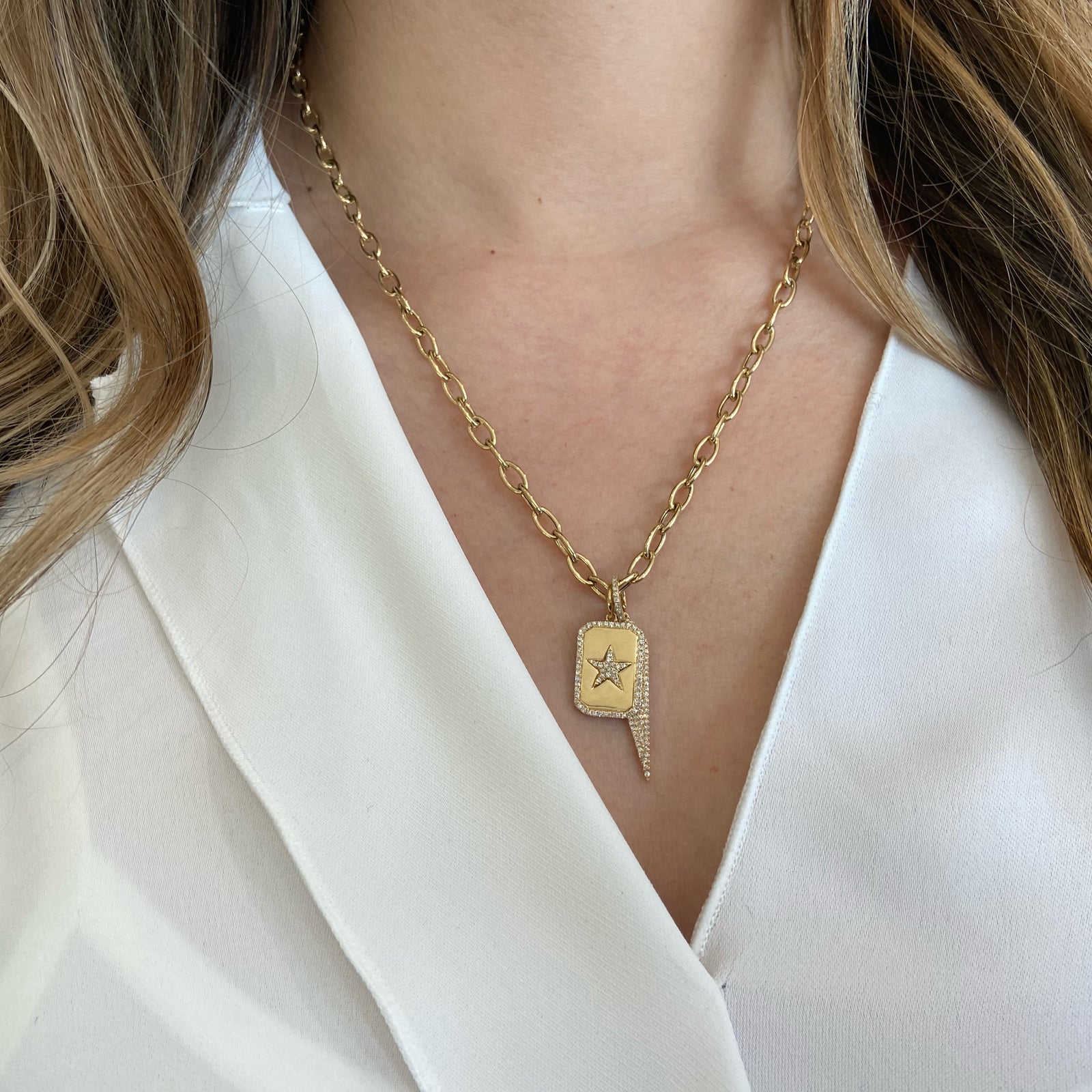 Diamond Star Dog Tag Charm  -14K gold weighing 3.35 grams  -72 round diamonds totaling 0.19 carats