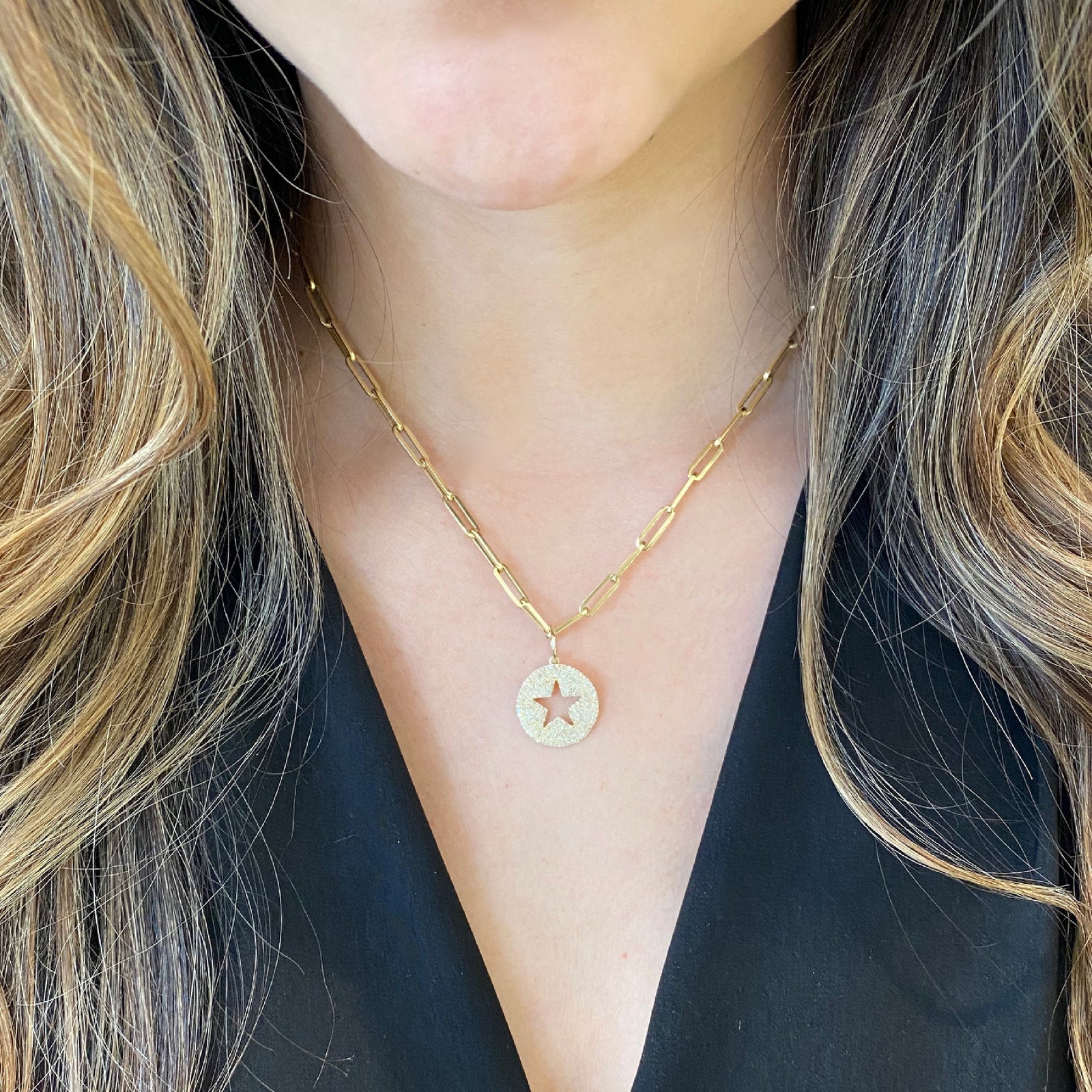 Diamond Star Cutout Pendant - 14K yellow gold weighing 2.48 grams - 210 round diamonds totaling 0.55 carats