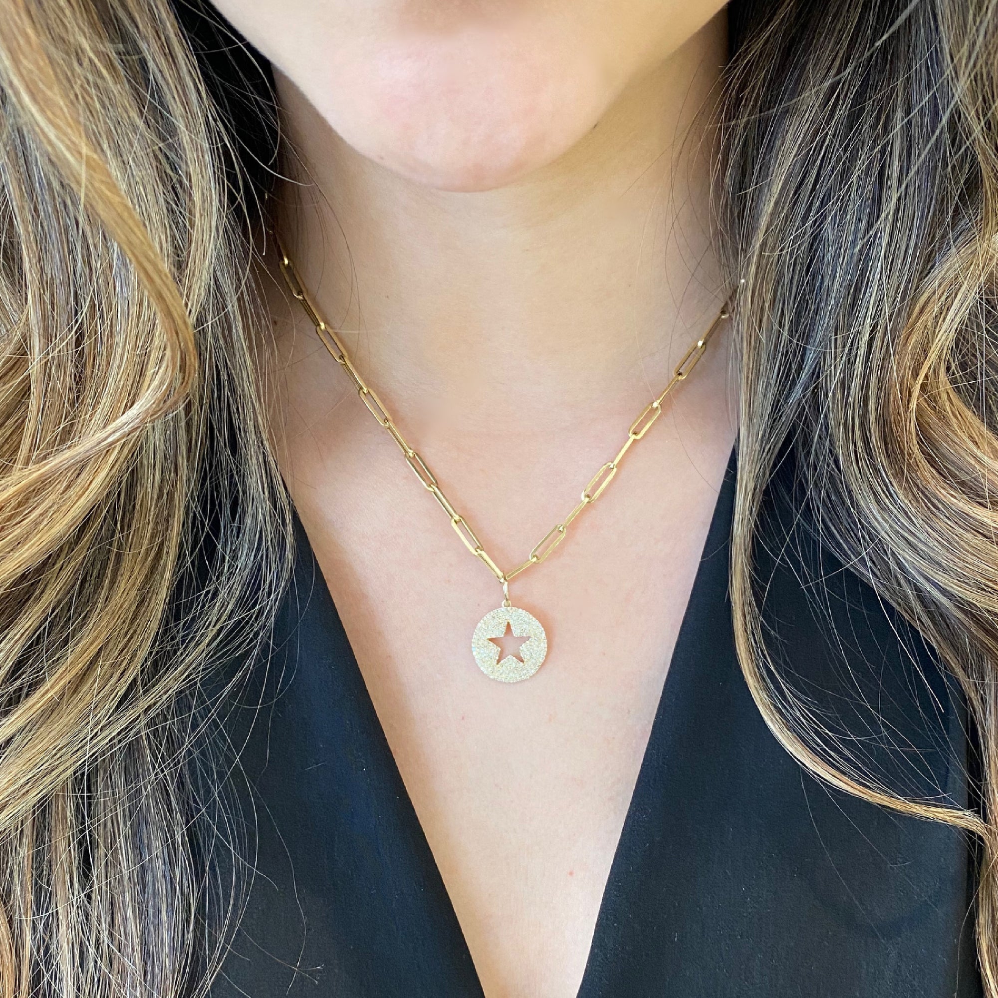 Diamond Star Cutout Pendant - 14K yellow gold weighing 2.48 grams - 210 round diamonds totaling 0.55 carats