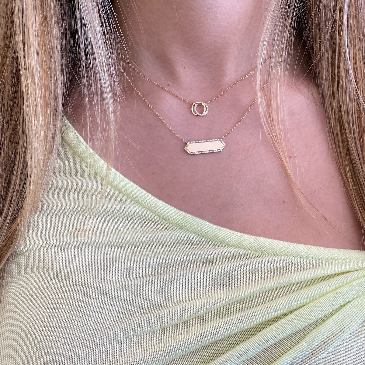 Female model wearing Diamond & Gold Interlocking Circles Pendant - 14K gold - 0.07 cts round diamonds