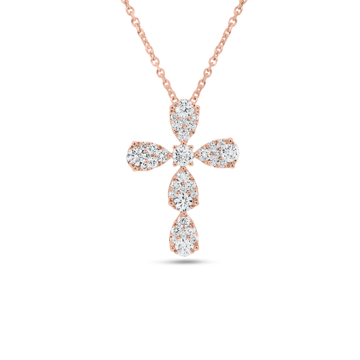 Diamond Teardrops Cross Pendant  - 18K gold weighing 1.46 grams; 14K gold weighing 1.60 grams  - 36 round diamonds totaling 0.65 carats