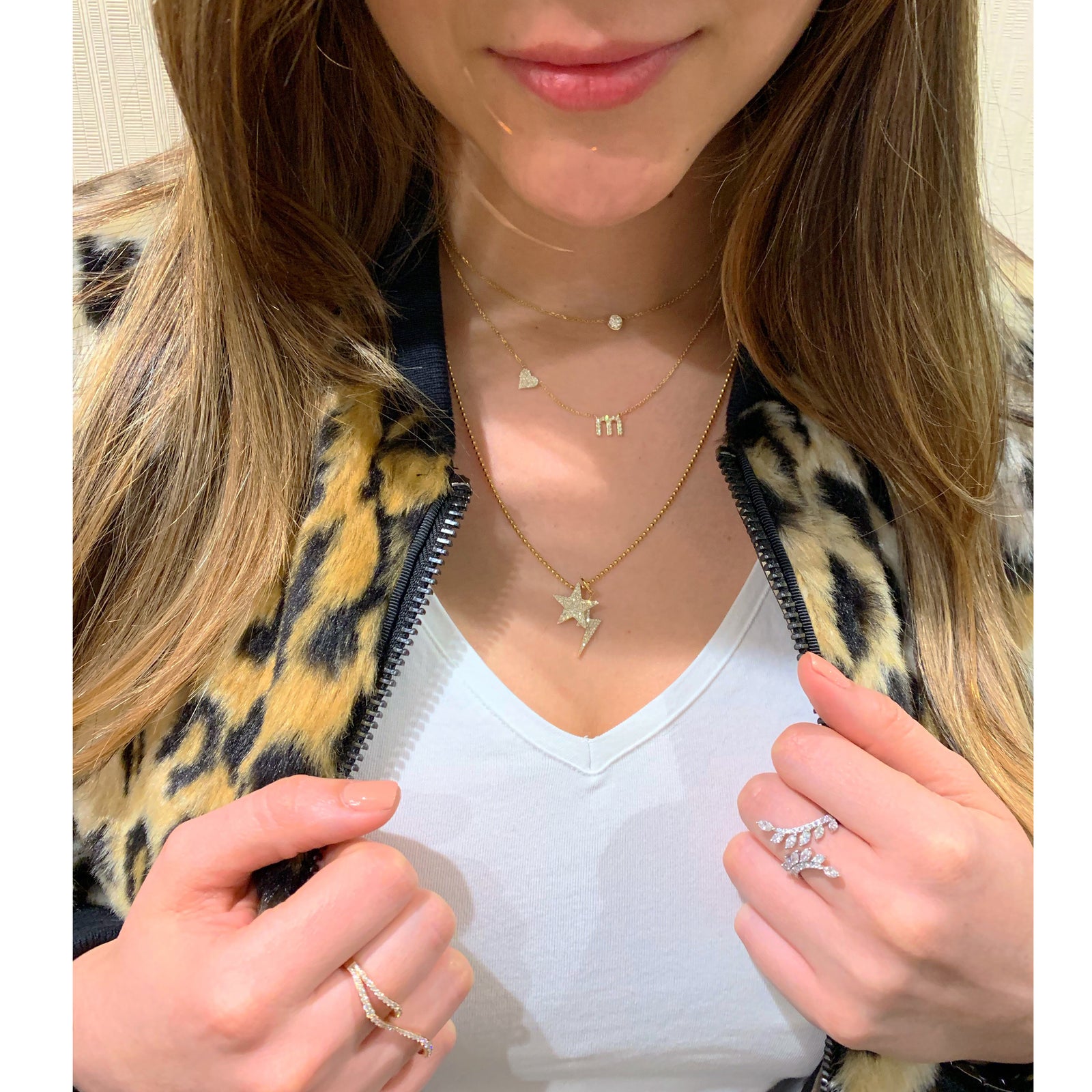 Diamond mini lowercase initial necklace -14k gold 1.8 grams  -10 round prong-set diamonds .08 carats (varies per letter)  - Chain measures 16"  -Letter width 6 millimeters, length 7 millimeters.