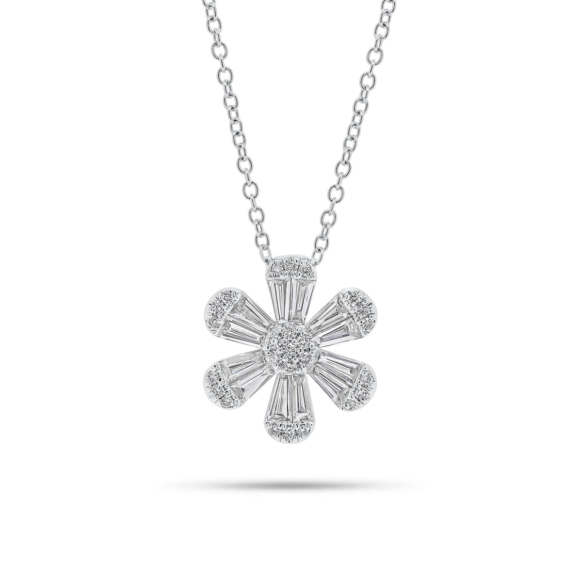 Round and Baguette Diamond Flower Pendant - 18K gold weighing 4.07 grams  - 25 round diamonds weighing 0.13 carats  - 12 slim baguettes weighing 0.64 carats