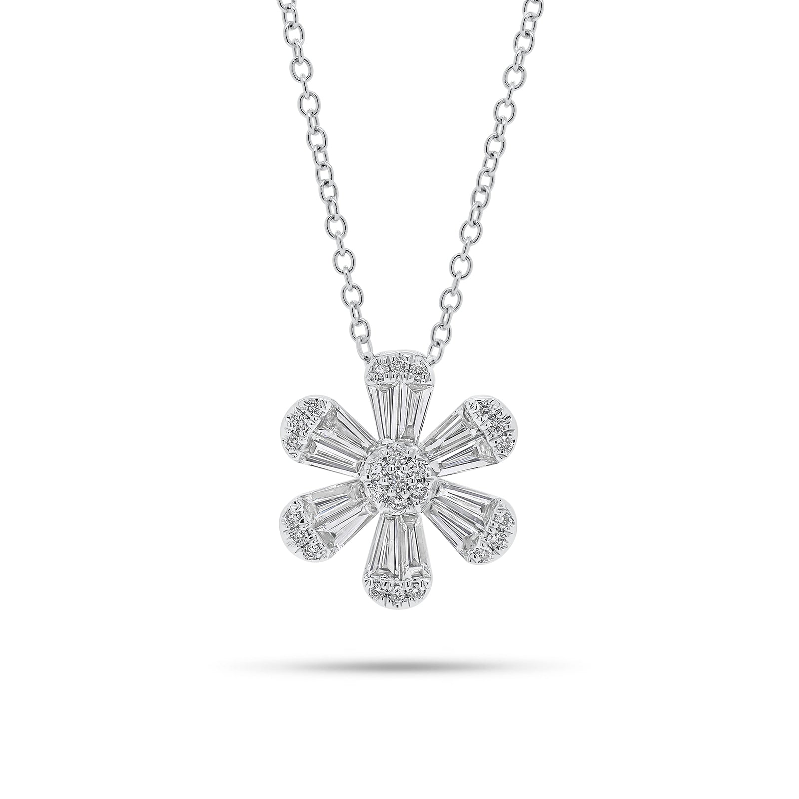 Round and Baguette Diamond Flower Pendant - 18K gold weighing 4.07 grams  - 25 round diamonds weighing 0.13 carats  - 12 slim baguettes weighing 0.64 carats