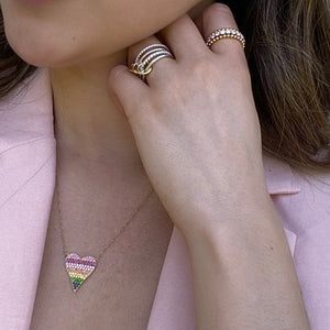 Female Model Wearing Multicolor Gemstone Heart Pendant  - 14K gold weighing 2.98 grams  - 103 multicolor gemstones totaling 0.82 carats