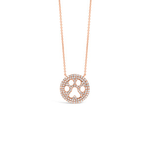 Solid 14K rose gold weighing 2.34 grams with 102 round diamonds totaling 0.23 carats Paw Print Cutout Pendant | Nuha Jewelers