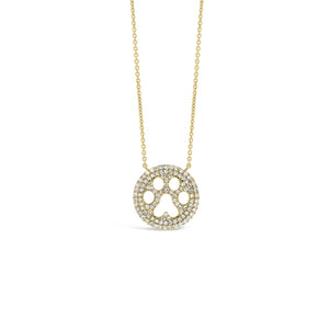Solid 14K yellow gold weighing 2.34 grams with 102 round diamonds totaling 0.23 carats Paw Print Cutout Pendant | Nuha Jewelers