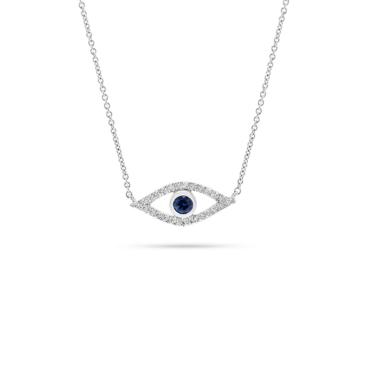 Sapphire & Diamond Open Evil Eye Pendant  - 14K white gold weighing 1.77 grams  - 26 round diamonds totaling 0.07 carats  - 0.11 ct sapphire