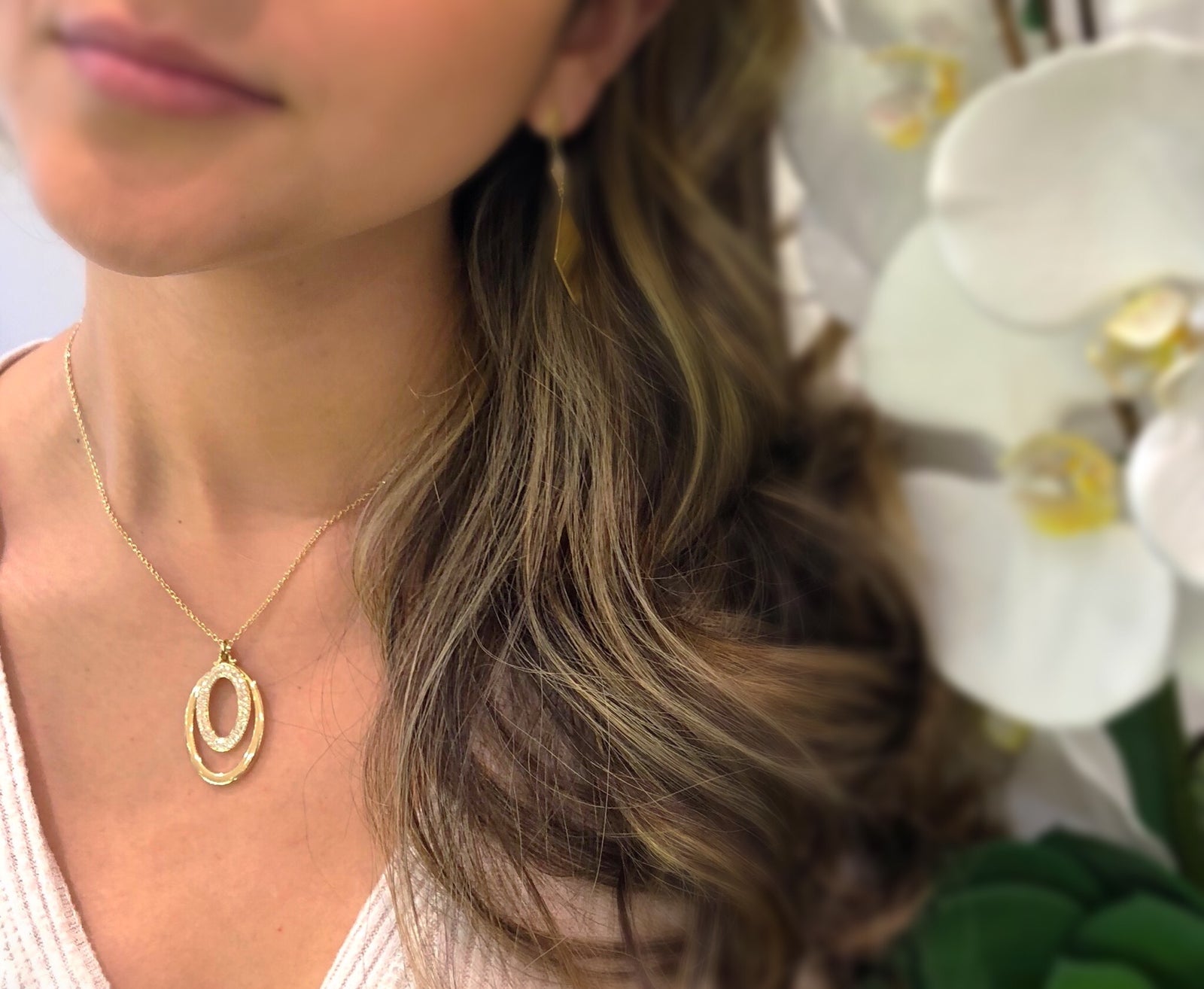 Diamond & Gold Oval Pendant Necklace -14K white gold weighing 9 grams -62 round pave-set diamonds totaling 0.46 carats.