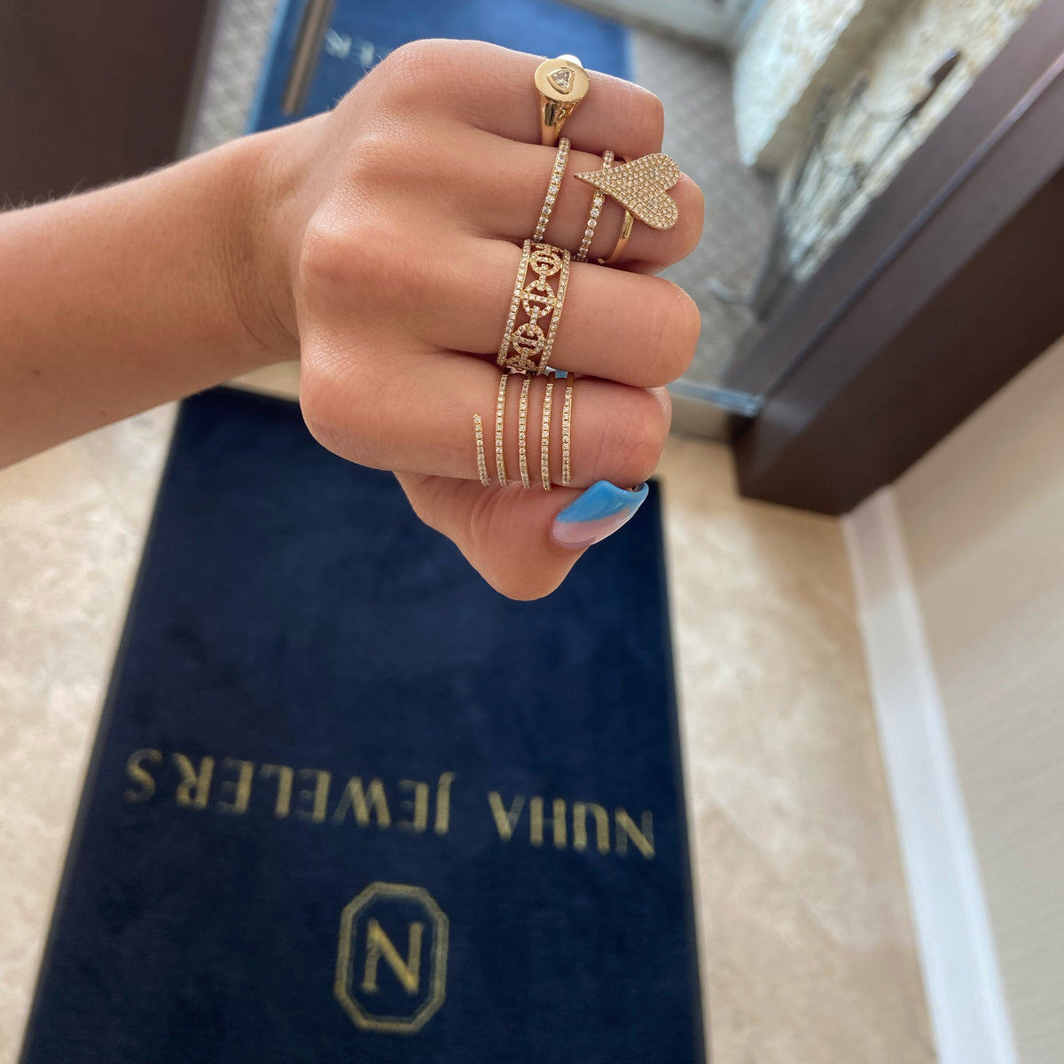 Female Model Wearing Diamond Heart Signet Ring  - 14K gold weighing 2.68 grams  - 0.15 ct heart-shaped diamond