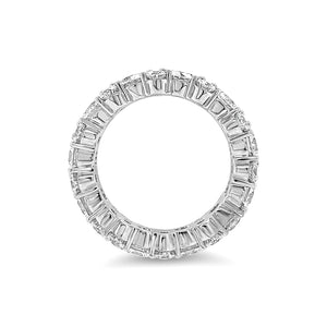 Staggered Diamond Eternity Band Lg   -18K gold weighing 6.91 grams  -11 round diamonds totaling 3.15 carats  -22 round diamonds totaling 1.87 carats