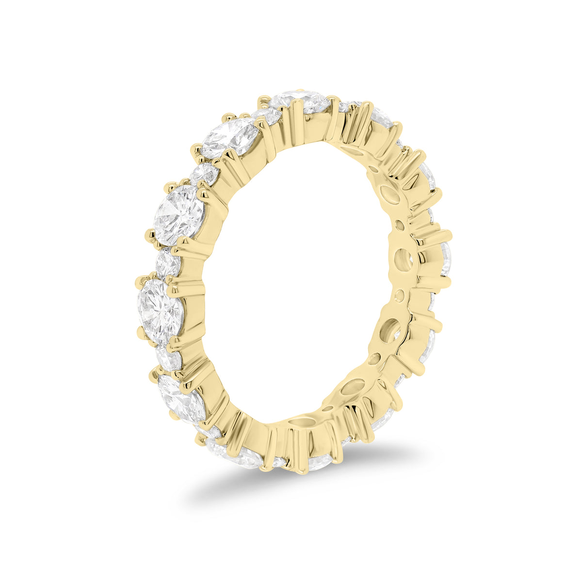 Diamond Eternity Band   -18K gold weighing 3.07 grams  -12 round diamonds totaling 2.13 carats  -12 round diamonds totaling 0.43 carats