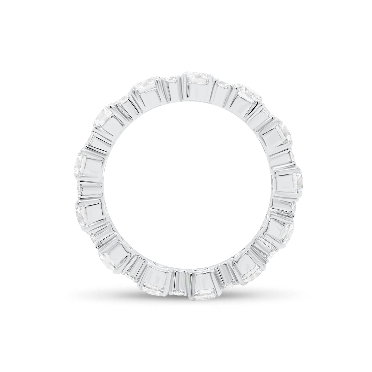 Diamond Eternity Band   -18K gold weighing 3.07 grams  -12 round diamonds totaling 2.13 carats  -12 round diamonds totaling 0.43 carats