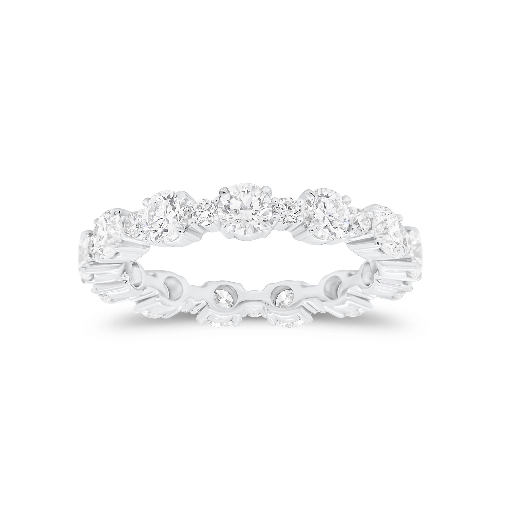 Diamond Eternity Band   -18K gold weighing 3.07 grams  -12 round diamonds totaling 2.13 carats  -12 round diamonds totaling 0.43 carats