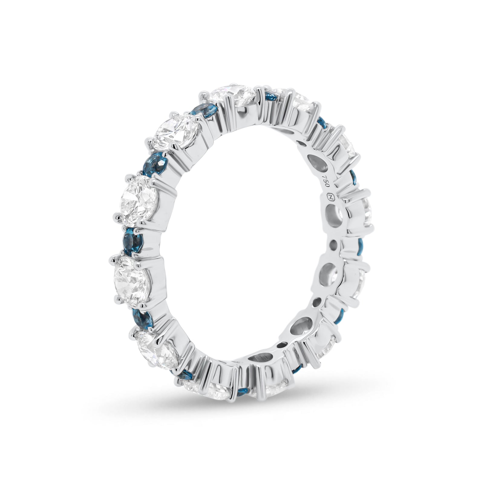 Classic Eternity Ring with Blue Aquamarine  - 18K gold weighing 3.07 grams  - 12 round diamonds totaling 2.13 carats  - 12 blue round aquamarine totaling 0.43 carats
