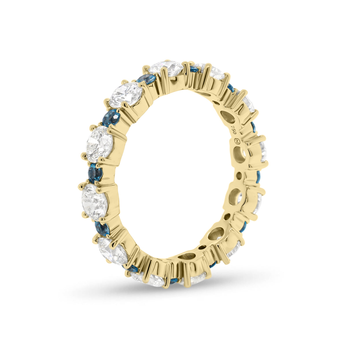 Classic Eternity Ring with Blue Aquamarine  - 18K gold weighing 3.07 grams  - 12 round diamonds totaling 2.13 carats  - 12 blue round aquamarine totaling 0.43 carats