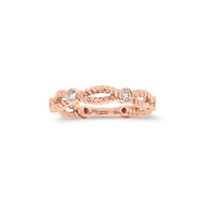 Twisted Gold Stackable Ring with Diamond Bezels  - 18K gold weighing 3.71 grams  - 4 round diamonds totaling 0.18 carats