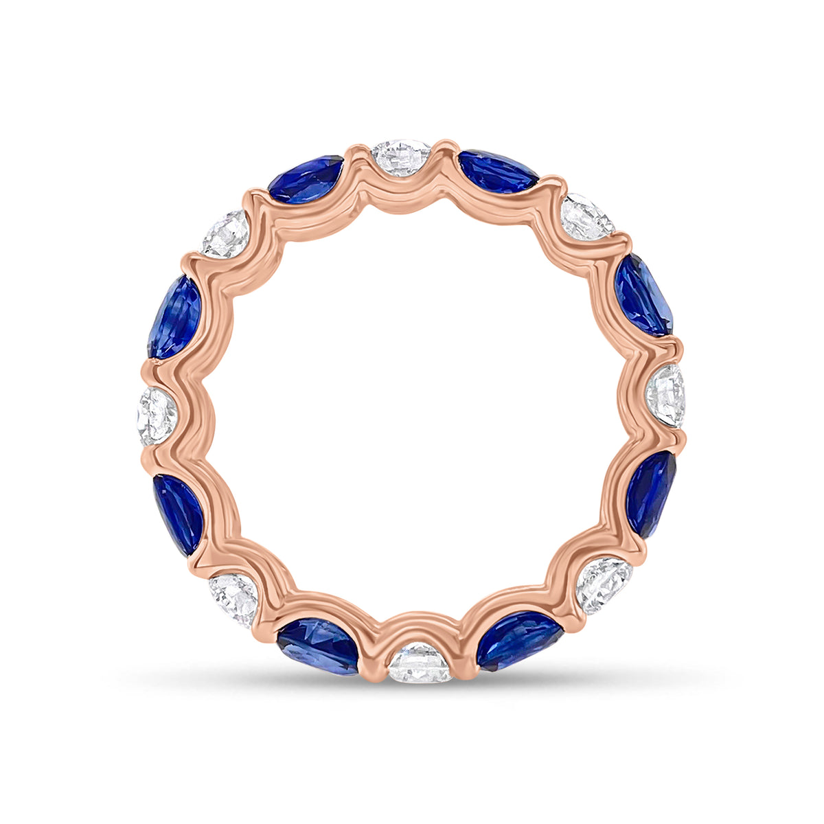 Sapphire & Diamond Eternity Ring - 18K gold weighing 2.67 grams - 8 round diamonds totaling 1.10 carats - 8 oval-shaped sapphires totaling 2.46 carats