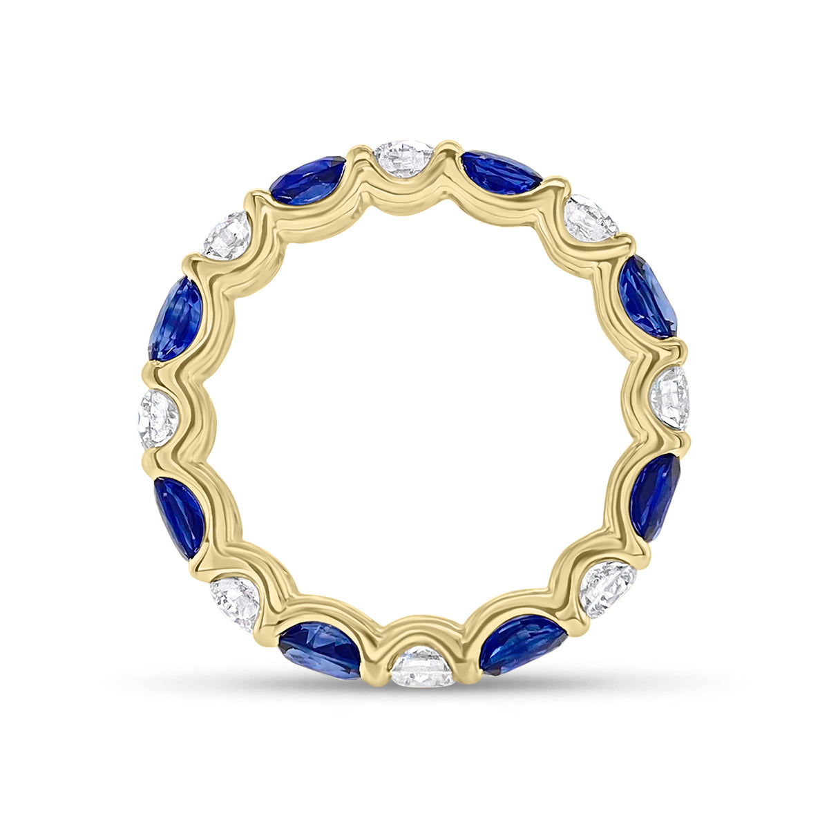 Sapphire & Diamond Eternity Ring - 18K gold weighing 2.67 grams - 8 round diamonds totaling 1.10 carats - 8 oval-shaped sapphires totaling 2.46 carats