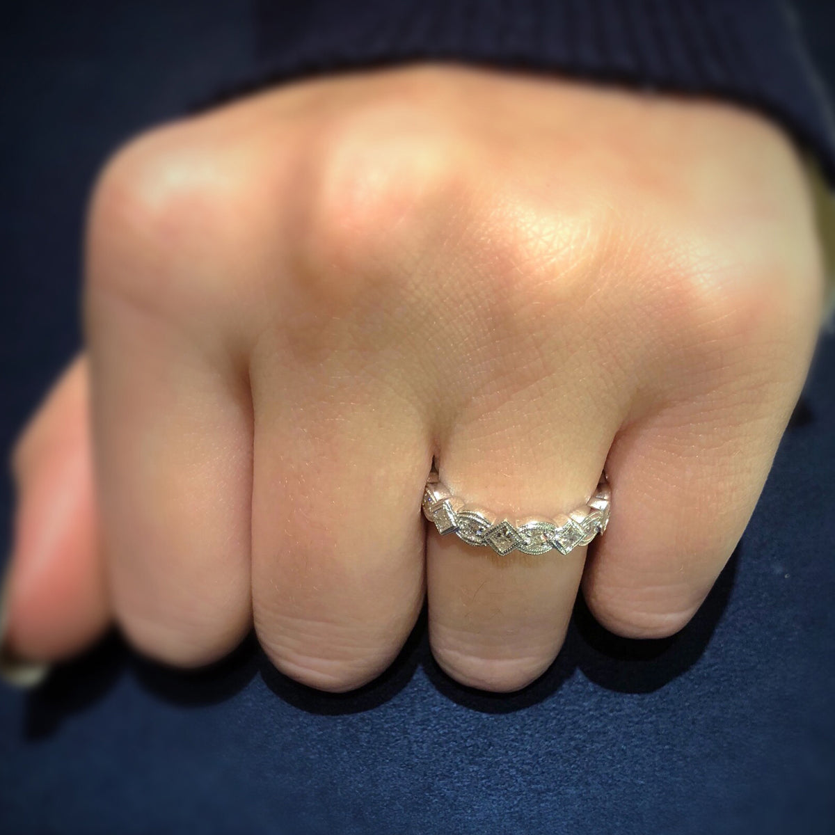 Geometric diamond eternity band ring -14k gold weighing 4.1 grams  -8 round diamonds weighing .24 carats  -9 PR weighing .68 carats