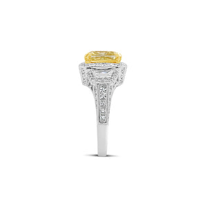 Fancy Light Yellow Cushion Halo Diamond Engagement Ring   - 18 kt white gold weighting 5.10 grams  - 70 round diamonds totaling 0.50 carats  - 10 princess-cut diamonds totaling 0.30 carats