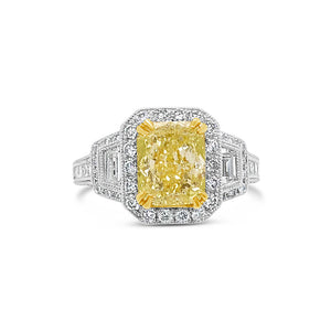 Fancy Light Yellow Cushion Halo Diamond Engagement Ring   - 18 kt white gold weighting 5.10 grams  - 70 round diamonds totaling 0.50 carats  - 10 princess-cut diamonds totaling 0.30 carats