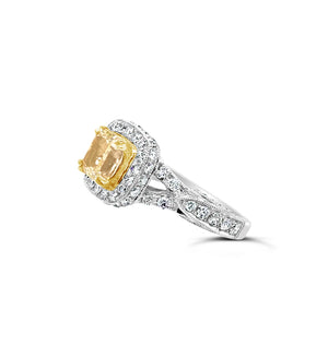 Intricate Setting Radiant-cut Yellow Diamond Engagement Ring  -18k gold weighing 7.4 grams  -84 round diamonds weighing 1.25 carats