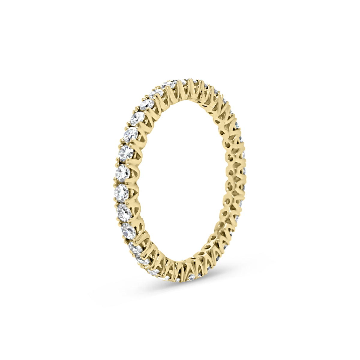Simple diamond eternity band ring -18k gold weighing 1.61 grams  -34 round four prong-set diamonds weighing .84 carats 