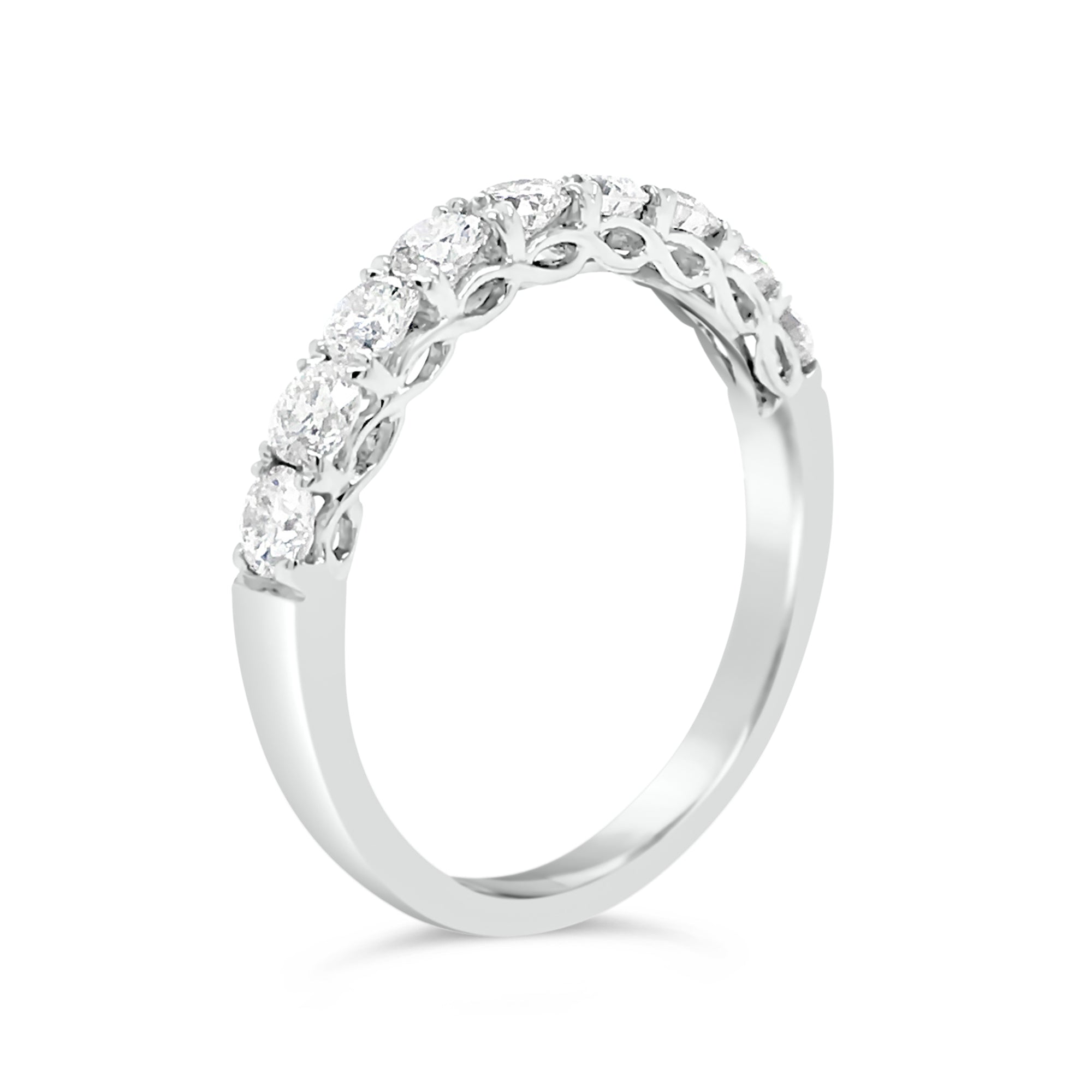 9 stone diamond wedding band -18k gold weighing 3.07 grams   -9 round diamonds weighing .77 carats 