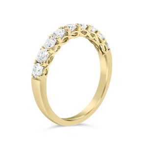 9 stone diamond wedding band -18k gold weighing 3.07 grams   -9 round diamonds weighing .77 carats 