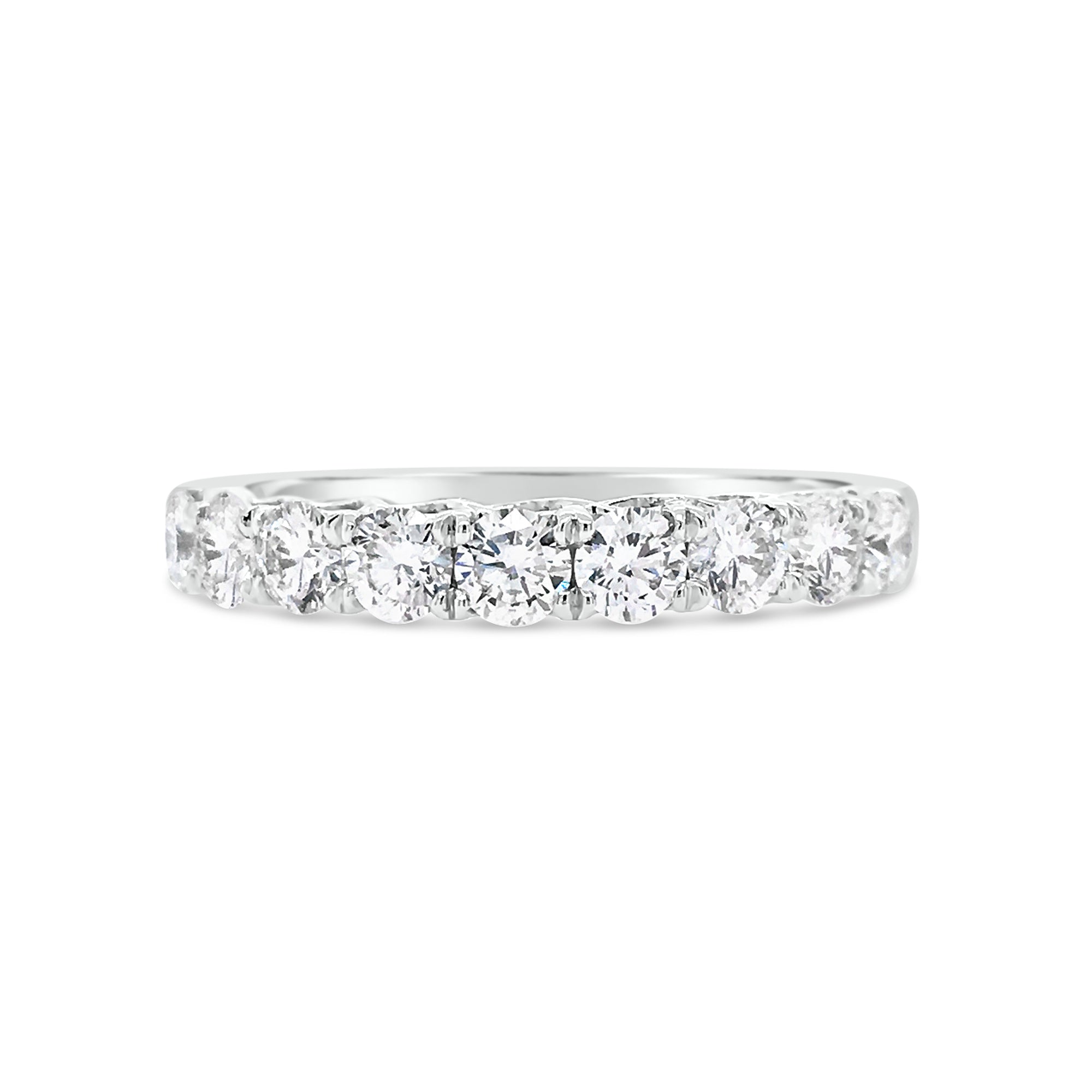 9 stone diamond wedding band -18k gold weighing 3.07 grams   -9 round diamonds weighing .77 carats 
