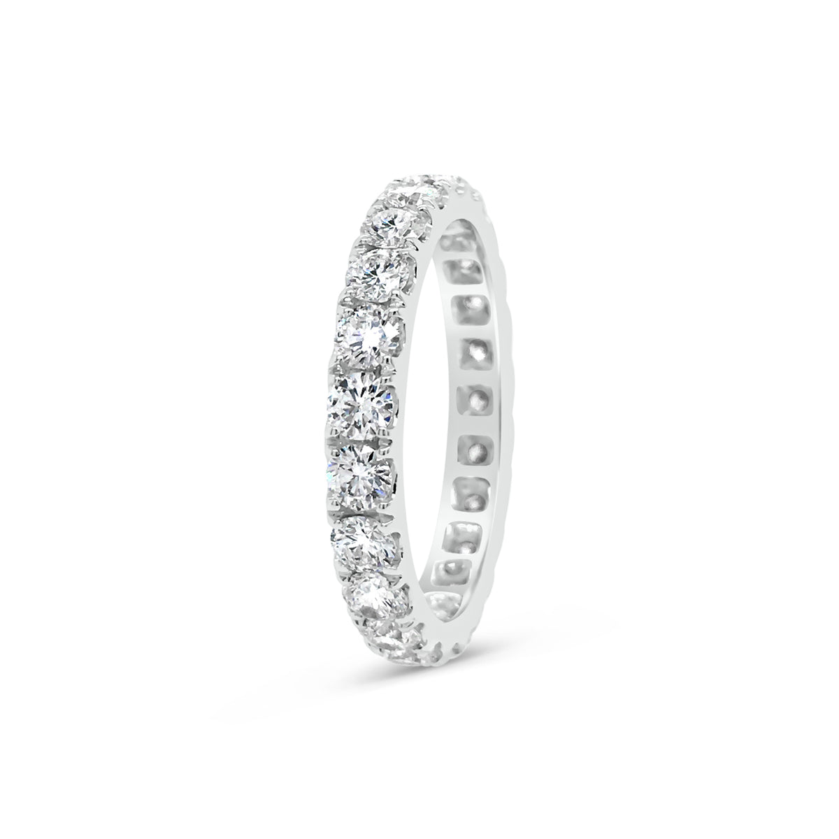Four Prong-Set Diamond Eternity Band  -18k gold weighing 2.62 grams  -23 round diamonds weighing 1.68 carats