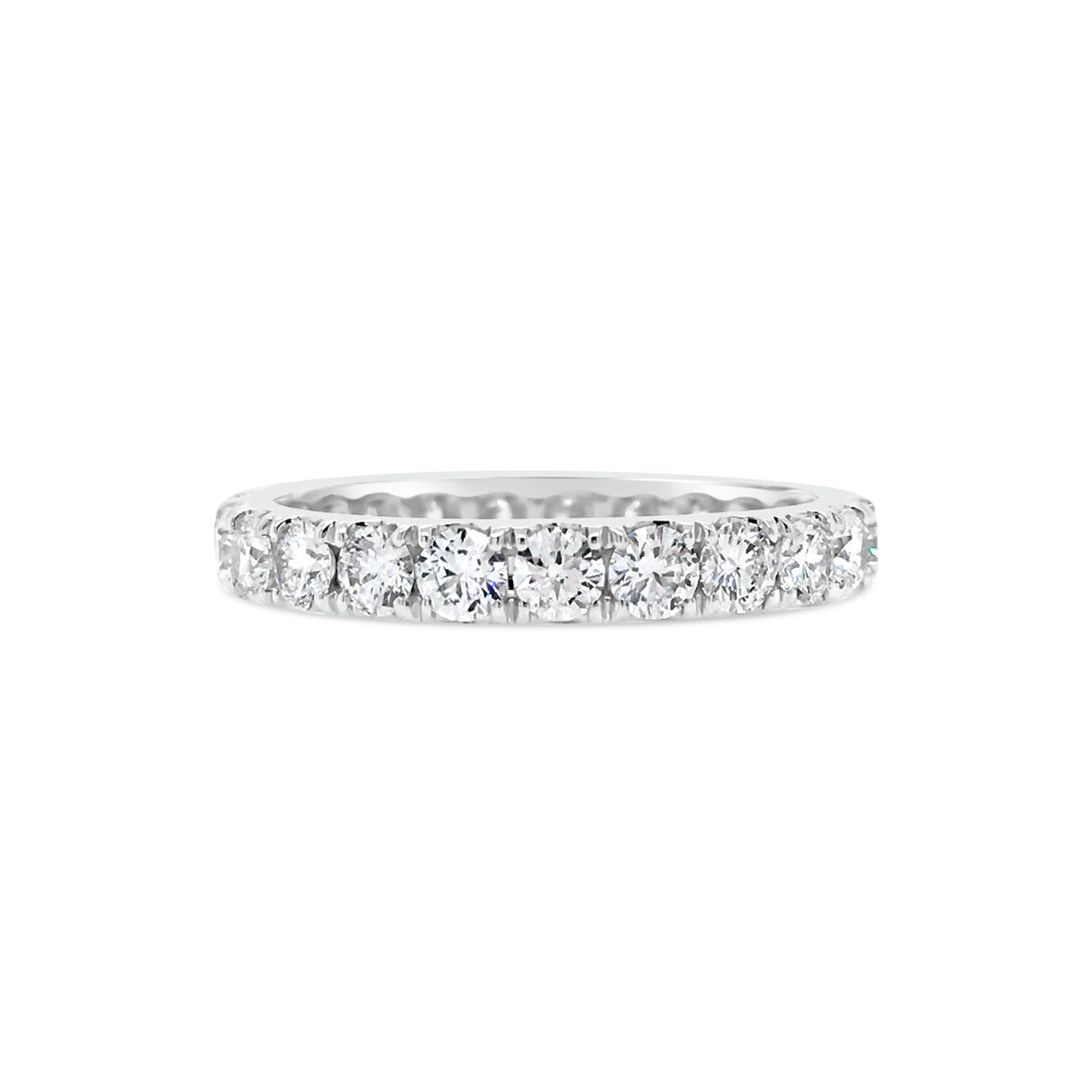 Four Prong-Set Diamond Eternity Band  -18k gold weighing 2.62 grams  -23 round diamonds weighing 1.68 carats