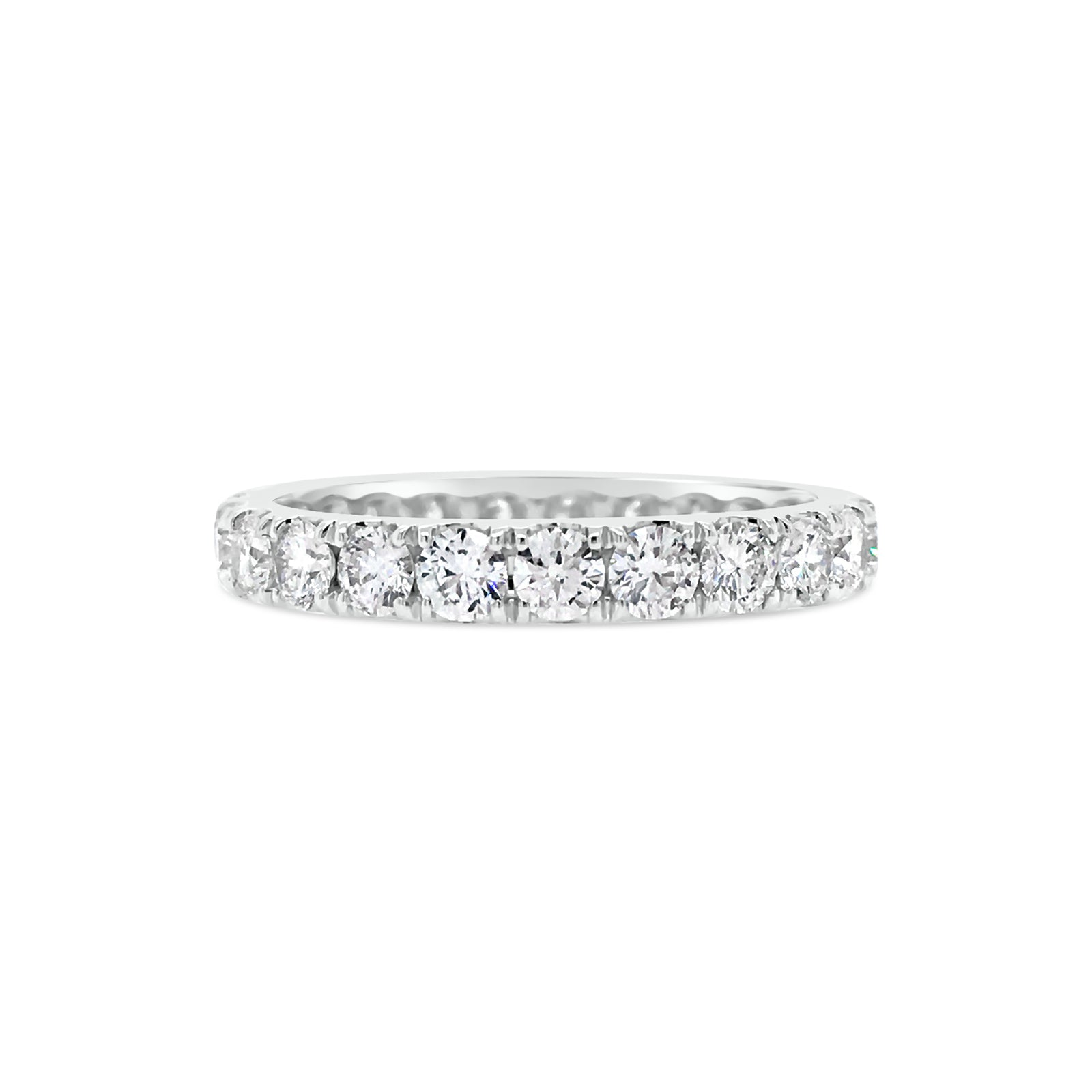 Four Prong-Set Diamond Eternity Band  -18k gold weighing 2.62 grams  -23 round diamonds weighing 1.68 carats