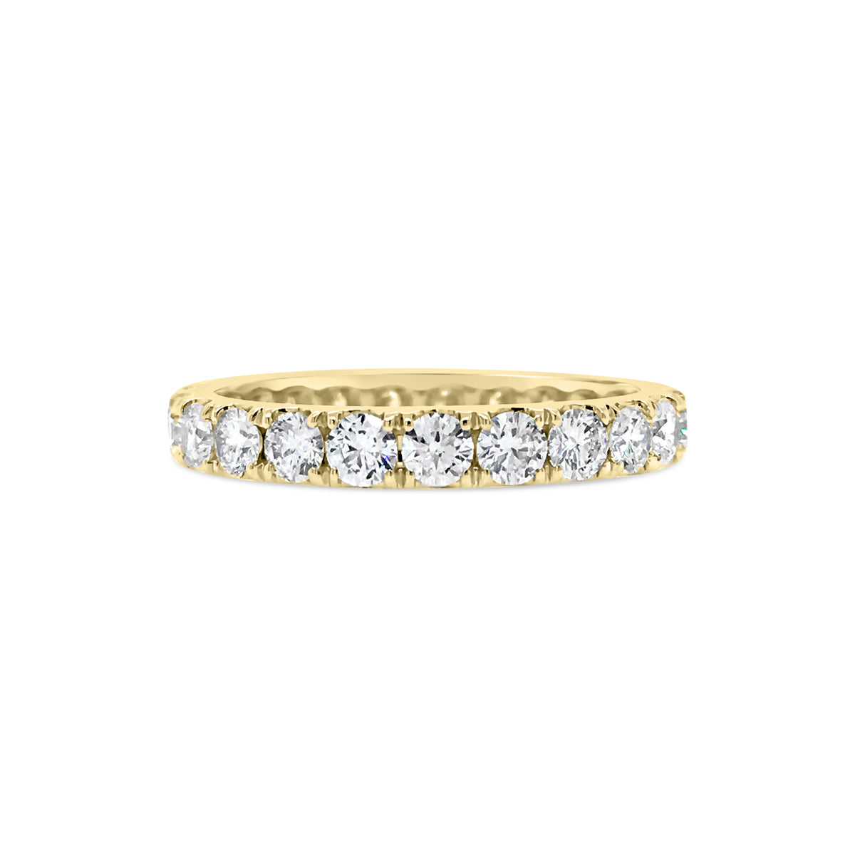 Four Prong-Set Diamond Eternity Band  -18k gold weighing 2.62 grams  -23 round diamonds weighing 1.68 carats