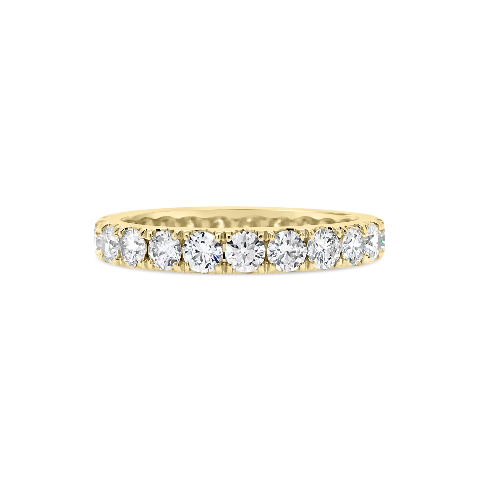 Four Prong-Set Diamond Eternity Band  -18k gold weighing 2.62 grams  -23 round diamonds weighing 1.68 carats