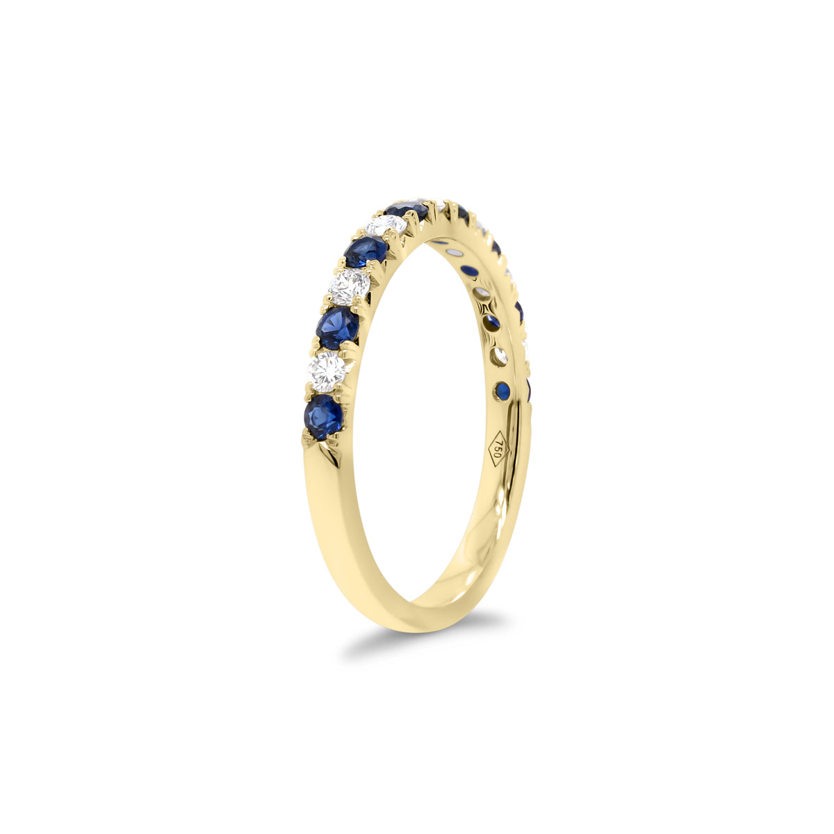Sapphire & Diamond Band  - 18K gold weighing 2.0 grams  - 7 round diamonds totaling 0.22 carats  - 8 sapphires totaling 0.35 carats